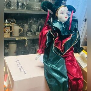 Vintage Victorian Porcelain Jester plays music. New in Box